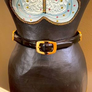 Vintage Brighton belt. Black leather with gold buckle and Accents.